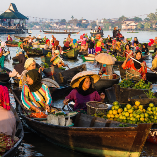 Local traders selling fresh produce at Banjarmasin floating market