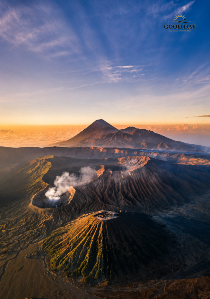 Smoke rising from Mount Bromo crater during sunrise