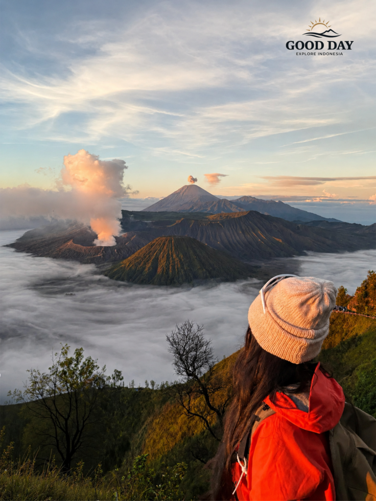 Woman enjoying Mount Bromo sunrise view in Indonesia