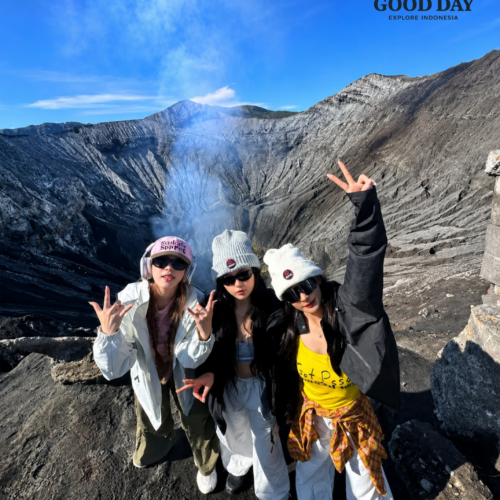 Stylish tourist enjoying Mount Bromo sunrise in Indonesia