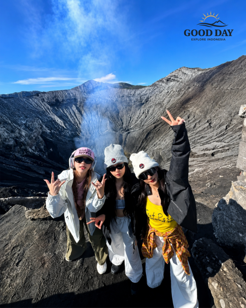 Stylish tourist enjoying Mount Bromo sunrise in Indonesia