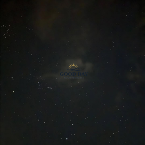Star-filled night sky above Pulau Seribu, Indonesia, featuring countless visible stars scattered across a dark tropical sky with light clouds drifting through the celestial landscape.