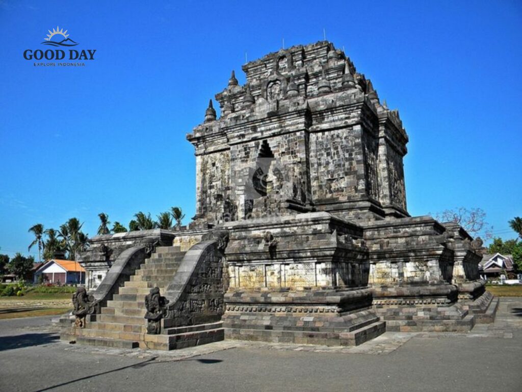 Candi Mendut, an ancient Buddhist temple in Magelang near Yogyakarta, Indonesia, featuring impressive stone architecture, detailed carvings, and a grand staircase under a clear blue sky. The historic temple is one of Central Java’s most important cultural and religious landmarks.