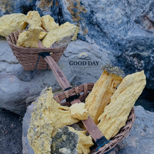 Traditional sulfur baskets used by miners at Kawah Ijen, East Java, Indonesia, filled with bright yellow sulfur rocks extracted from the active volcanic crater.