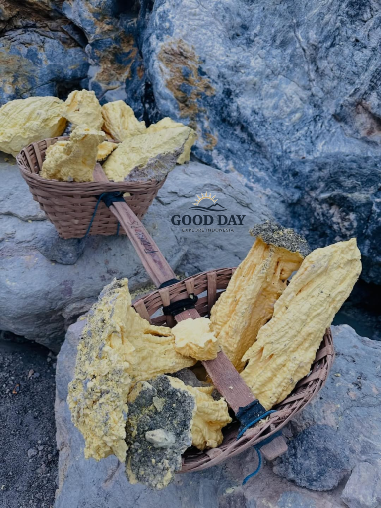 Traditional sulfur baskets used by miners at Kawah Ijen, East Java, Indonesia, filled with bright yellow sulfur rocks extracted from the active volcanic crater.