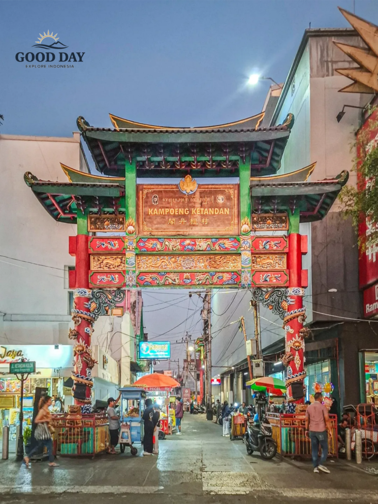 The iconic Kampoeng Ketandan gate in Malioboro, Yogyakarta, Indonesia, illuminated at night and marking the entrance to the city's historic Chinese heritage district and culinary area.