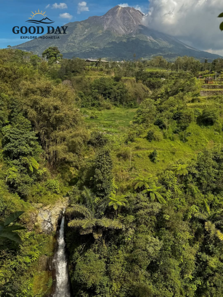 Panoramic view of Kedung Kayang Waterfall and Mount Merapi near Selogriyo Temple, featuring a lush green valley, tropical forest, and one of the most breathtaking natural landscapes in Central Java, Indonesia.
