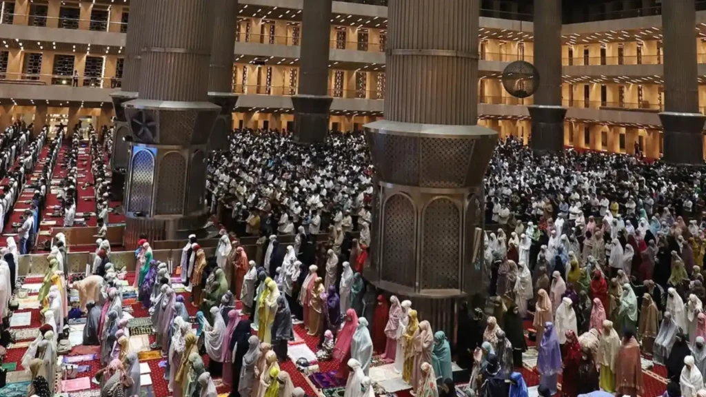 Thousands of Muslims performing Eid al-Fitr prayer inside Istiqlal Mosque in Central Jakarta, Indonesia, the largest mosque in Southeast Asia.