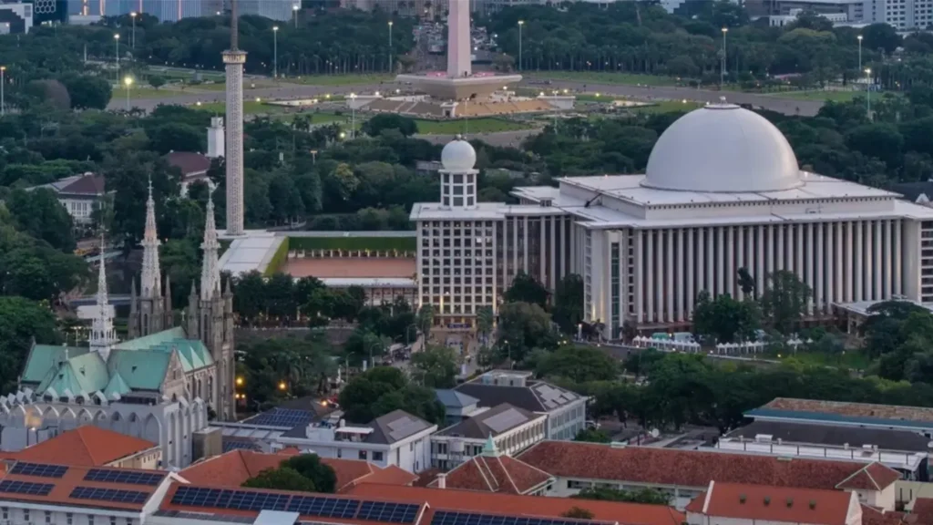 Drone aerial view of Istiqlal Mosque in Central Jakarta, Indonesia, the largest mosque in Southeast Asia, located beside Jakarta Cathedral and Monas.