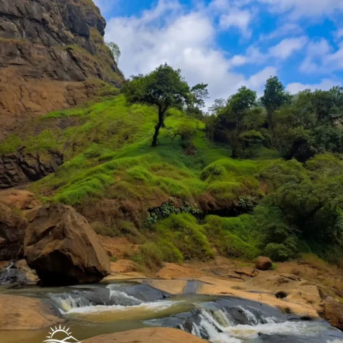 Travelers exploring Geopark Ciletuh in West Java on a one-day trip from Jakarta with Good Day Tour, featuring spectacular waterfalls, rainforest, cliffs, and UNESCO Global Geopark landscapes.