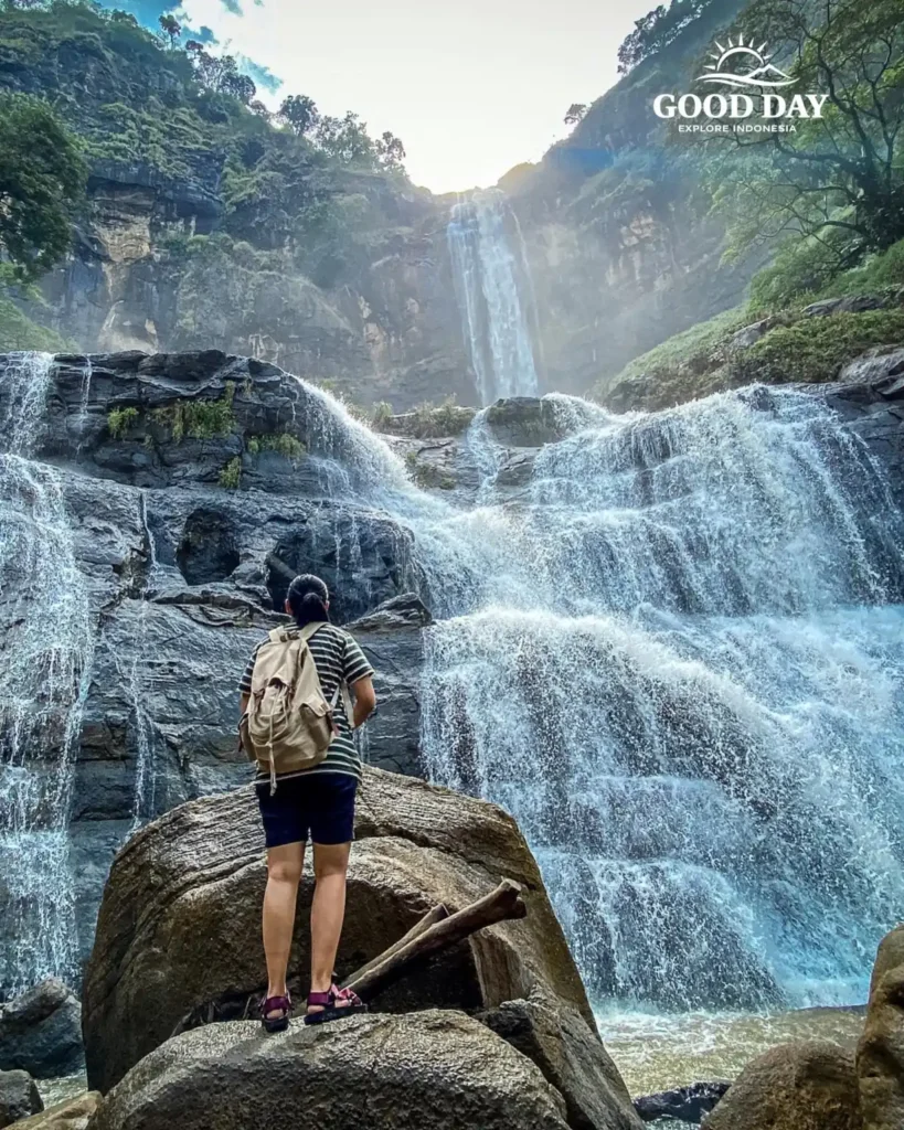 Travelers exploring Geopark Ciletuh in West Java on a one-day trip from Jakarta with Good Day Tour, featuring spectacular waterfalls, rainforest, cliffs, and UNESCO Global Geopark landscapes.