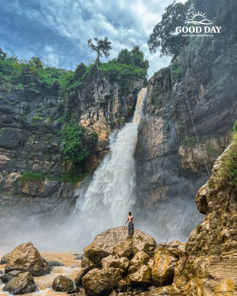 Travelers exploring Geopark Ciletuh in West Java on a one-day trip from Jakarta with Good Day Tour, featuring spectacular waterfalls, rainforest, cliffs, and UNESCO Global Geopark landscapes.