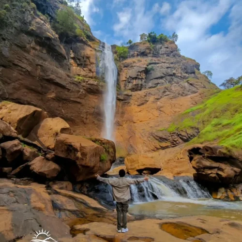 Travelers exploring Geopark Ciletuh in West Java on a one-day trip from Jakarta with Good Day Tour, featuring spectacular waterfalls, rainforest, cliffs, and UNESCO Global Geopark landscapes.