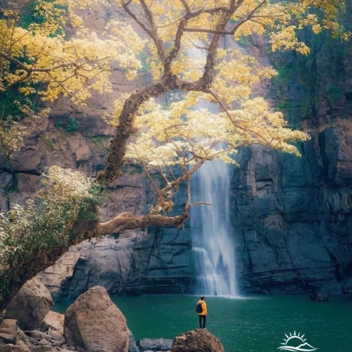 Travelers exploring Geopark Ciletuh in West Java on a one-day trip from Jakarta with Good Day Tour, featuring spectacular waterfalls, rainforest, cliffs, and UNESCO Global Geopark landscapes.