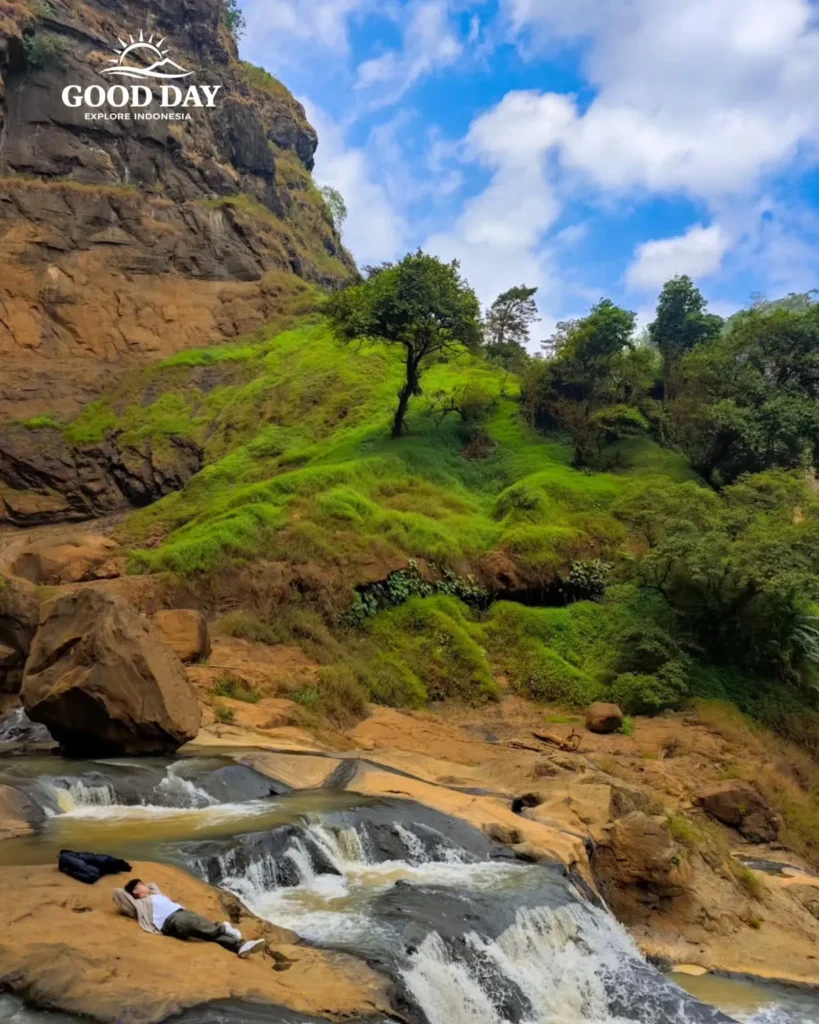 Travelers exploring Geopark Ciletuh in West Java on a one-day trip from Jakarta with Good Day Tour, featuring spectacular waterfalls, rainforest, cliffs, and UNESCO Global Geopark landscapes.